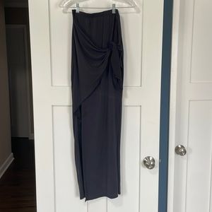 Grey floor length skirt.